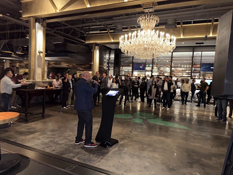 Speaker addressing audience at corporate event